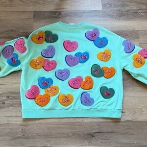 "QUEEN OF HEARTS"
Colorful Heart Patch Sweatshirt